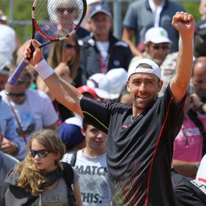 Benjamin Becker of Germany reacts after winning his French Open men s second round match against Fernando Verdasco of Spain at Roland Garros in Paris on May 27, 2015. Becker defeated Verdasco 6-4, 0-6, 1-6, 7-5, 10-8 to advance to the next round.  PAR20150527756 DAVIDxSILPA