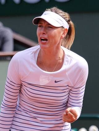 Maria Sharapova of Russia reacts after a shot during her French Open women s third round match against Australian Samantha Stosur at Roland Garros in Paris on May 29, 2015.  PAR20150529733 DAVIDxSILPA