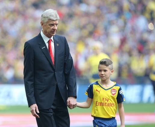 Arsenal s manager Arsene Wenger walks out with a mascot FA Cup Final - Arsenal vs Aston Villa - Wembley Stadium - England - 30th May 2015 - Picture David Klein Sportimage EDITORIAL USE ONLY. No use with unauthorised audio, video, data, fixture lists, club league logos or live services. Online in-match use limited to 120 images, no video emulation. No use in betting, games or single club league player publications.