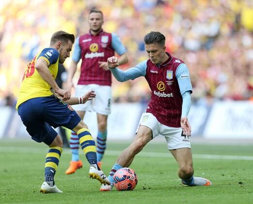 Arsenal s Aaron Ramsey tussles with Aston Villa s Jack Grealish FA Cup Final - Arsenal vs Aston Villa - Wembley Stadium - England - 30th May 2015 - Picture David Klein Sportimage EDITORIAL USE ONLY. No use with unauthorised audio, video, data, fixture lists, club league logos or live services. Online in-match use limited to 120 images, no video emulation. No use in betting, games or single club league player publications.