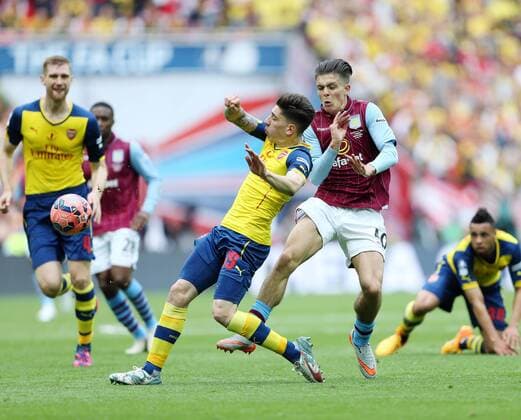 Arsenal s Hector Bellerin tussles with Aston Villa s Jack Grealish FA Cup Final - Arsenal vs Aston Villa - Wembley Stadium - England - 30th May 2015 - Picture David Klein Sportimage EDITORIAL USE ONLY. No use with unauthorised audio, video, data, fixture lists, club league logos or live services. Online in-match use limited to 120 images, no video emulation. No use in betting, games or single club league player publications.