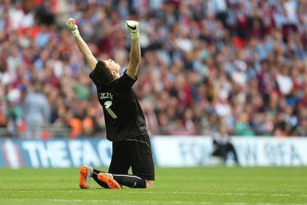 Arsenal s Wojciech Szczesny celebrates his sides second goal - Arsenal vs. Aston Villa - FA Cup Final - Wembley Stadium - London - 30 05 2015 Pic Philip Oldham Sportimage EDITORIAL USE ONLY. No use with unauthorised audio, video, data, fixture lists, club league logos or live services. Online in-match use limited to 120 images, no video emulation. No use in betting, games or single club league player publications.