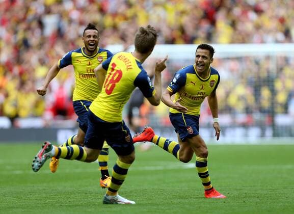 Arsenal s Alexis Sanchez celebrates scoring the second goal FA Cup Final - Arsenal vs Aston Villa - Wembley Stadium - England - 30th May 2015 - Picture David Klein Sportimage EDITORIAL USE ONLY. No use with unauthorised audio, video, data, fixture lists, club league logos or live services. Online in-match use limited to 120 images, no video emulation. No use in betting, games or single club league player publications.