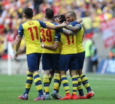 Arsenal s Alexis Sanchez celebrates scoring the second goal with first goal score Theo Walcott FA Cup Final - Arsenal vs Aston Villa - Wembley Stadium - England - 30th May 2015 - Picture David Klein Sportimage EDITORIAL USE ONLY. No use with unauthorised audio, video, data, fixture lists, club league logos or live services. Online in-match use limited to 120 images, no video emulation. No use in betting, games or single club league player publications.