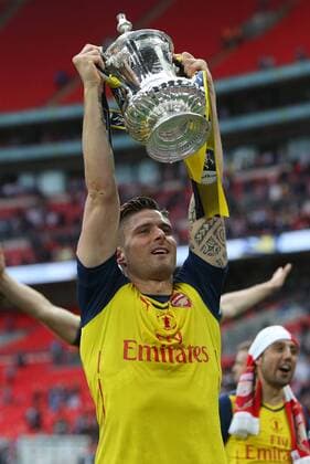 Arsenal s Olivier Giroud lifs the FA Cup - Arsenal vs. Aston Villa - FA Cup Final - Wembley Stadium - London - 30 05 2015 Pic Philip Oldham Sportimage EDITORIAL USE ONLY. No use with unauthorised audio, video, data, fixture lists, club league logos or live services. Online in-match use limited to 120 images, no video emulation. No use in betting, games or single club league player publications.