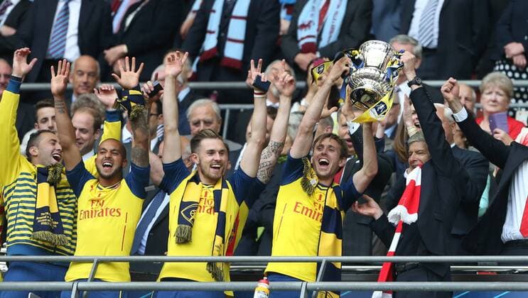 Arsenal s manager Arsene Wenger lifts the 2015 FA Cup - FA Cup Final - Arsenal vs Aston Villa - Wembley Stadium - England - 30th May 2015 - Picture David Klein Sportimage EDITORIAL USE ONLY. No use with unauthorised audio, video, data, fixture lists, club league logos or live services. Online in-match use limited to 120 images, no video emulation. No use in betting, games or single club league player publications.