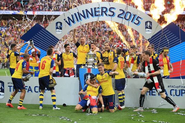 Arsenal s players celebrate with the trophy FA Cup Final - Arsenal vs Aston Villa - Wembley Stadium - England - 30th May 2015 - Picture David Klein Sportimage EDITORIAL USE ONLY. No use with unauthorised audio, video, data, fixture lists, club league logos or live services. Online in-match use limited to 120 images, no video emulation. No use in betting, games or single club league player publications.