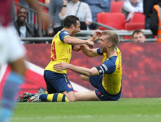Arsenal s Per Mertesacker celebrates scoring his sides third goal FA Cup Final - Arsenal vs Aston Villa - Wembley Stadium - England - 30th May 2015 - Picture David Klein Sportimage EDITORIAL USE ONLY. No use with unauthorised audio, video, data, fixture lists, club league logos or live services. Online in-match use limited to 120 images, no video emulation. No use in betting, games or single club league player publications.