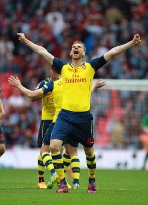 The FA Cup Final - Arsenal v Aston Villa . . London, UK . . 30.05.2015 Per Mertesacker (A) celebrates winning the FA Cup. 