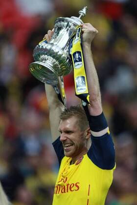 The FA Cup Final - Arsenal v Aston Villa . . London, UK . . 30.05.2015 Per Mertesacker (A) celebrates with the FA Cup. 