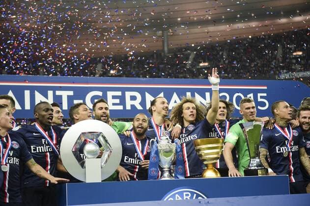 Jubel des joueurs Parisiens avec les 4 trophees gagnes durant la saison coupe de france coupe de la ligue trophee des champions trophee du vainqueur du championnat de L1 FOOTBALL : PSG - Finale coupe de France - 30 05 2015 