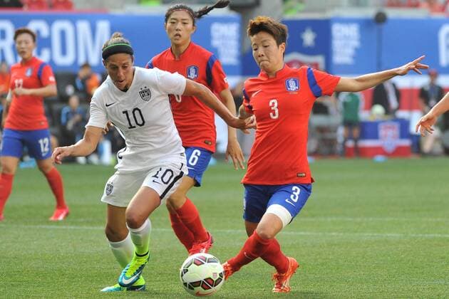 May 30, 2015 - Harrison, New Jersey, U.S - Korea Republic defender HYERI KIM (3) clears the ball from US WomenÃ¢â‚¬â ¢s national team Nationalteam midfielder CARLI LLOYD (10) during the pre-Women s World Cup friendly at Red Bull Arena in Harrison New Jersey The USWNT draws with Korea Republic 0 to 0 FIFA 2015 - USWNT draws with Korea Republic - ZUMAa301
