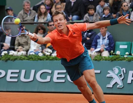 Tomas Berdych of the Czech Republic hits a shot during his French Open men s fourth round match against Jo-Wilfried Tsonga of France at Roland Garros in Paris on May 31, 2015. Tsonga defeated Berdych 6-3, 6-2, 6-7 (5), 6-3 to advance to the next round.  PAR20150531732 DAVIDxSILPA