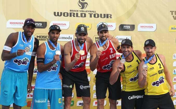 MOSCOW, RUSSIA. MAY 31, 2015. Brazil s silver medalists Evandro Goncalves Oliveira Junior, Pedro Solberg Salgado, Spain s gold medalists Pablo Herrera, Adrian Gavira, and Germany s bronze medalists Jonathan Erdmann, Kay Matysik (L-R) pose at an awards ceremony after the 2015 FIVB Beach volleyball Beachvolleyball Grand Slam men s tournament in Moscow. Artyom Korotayev TASS  TS004CF4