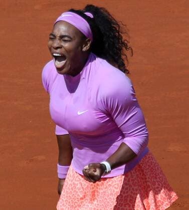 American Serena Williams reacts after a shot during her French Open women s fourth round match against American Sloane Stephens at Roland Garros in Paris on June 1, 2015. Williams defeated Stephens 1-6, 7-5, 6-3 to advance to the next round.  PAR20150601744 DAVIDxSILPA