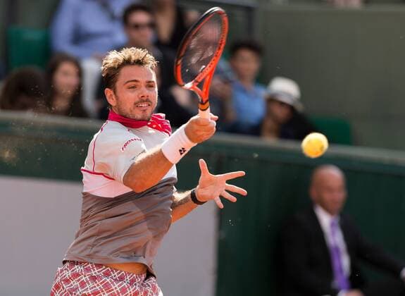 02.06.2015. Roland Garros, Paris, France. Stan Wawrinka of Switzerland in action against Roger Federer of Switzerland during their Men s Singles match on day ten of the 2015 French Open 2015 in Paris, France. Wawrinka won the match 6-4 6-3 7-6 to move into the semi finals xBenxPipex  ActionPlus11627059