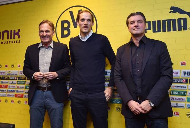 03.06.2015, Fussball, Saison 2015 16, 1. Bundesliga, Pressekonferenz, Vorstellung von Thomas Tuchel als neuer Trainer von Borussia Dortmund, v.re., Manager Michael Zorc (Borussia Dortmund), Trainer Thomas Tuchel (Borussia Dortmund), Geschaeftsfuehrer Hans-Joachim Watzke (Hans Joachim Watzke, Borussia Dortmund)