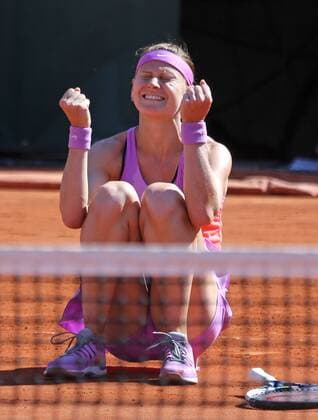 Lucie Safarova of the Czech Republic reacts after winning her French Open women s semifinal match against Ana Ivanovic of Serbia at Roland Garros in Paris on June 4, 2015. Ivanovic defeated Safarova 6-1, 6-3 to advance to the finals.  PAR20150604724 DAVIDxSILPA