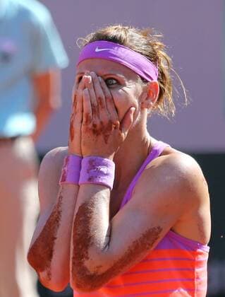 Lucie Safarova of the Czech Republic reacts after winning her French Open women s semifinal match against Ana Ivanovic of Serbia at Roland Garros in Paris on June 4, 2015. Ivanovic defeated Safarova 6-1, 6-3 to advance to the finals.  PAR20150604727 DAVIDxSILPA