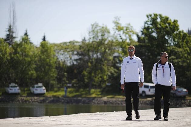 June 4, 2015 - Montreal, Canada - JENSON BUTTON of Great Britain and McLaren Honda is seen arriving in the paddock during preparations of the 2015 Formula 1 Canadian Grand Prix at Circuit Gilles Villeneuve in Montreal, Canada. F1 2015 - Canadian Grand Prix - Preparations - ZUMAg147
