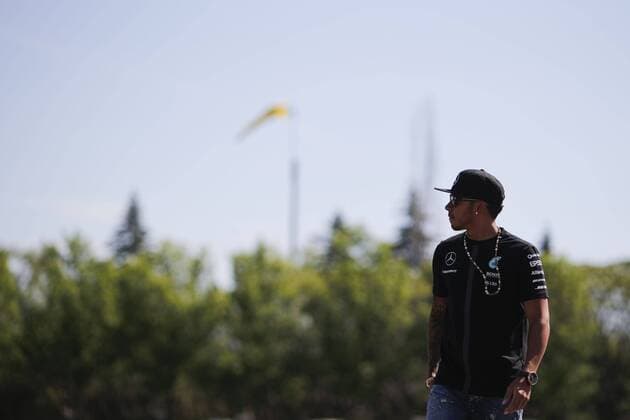 June 4, 2015 - Montreal, Canada - LEWIS HAMILTON of Great Britain and Mercedes AMG Petronas F1 Team is seen arriving in the paddock during preparations of the 2015 Formula 1 Canadian Grand Prix at Circuit Gilles Villeneuve in Montreal, Canada. F1 2015 - Canadian Grand Prix - Preparations - ZUMAg147
