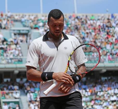 Jo-Wilfried Tsonga of France pauses during his French Open men s semifinal match against Stan Wawrinka of Switzerland at Roland Garros in Paris on June 5, 2015.  PAR20150605705 DAVIDxSILPA