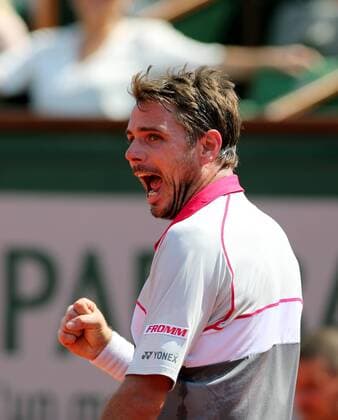Stan Wawrinka of Switzerland celebrates during the men s singles semifinal against Jo-Wilfried Tsonga of France at 2015 French Open tennis tournament at Roland Garros in Paris June 5, 2015. Wawrinka won 3-1 and advanced to the final. ) (SP)FRANCE-PARIS-TENNIS-FRENCH OPEN HanxYan 