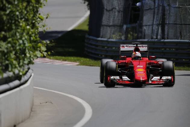 June 6, 2015 - Montreal, Canada - SEBASTIAN VETTEL of Germany and Scuderia Ferrari drives during the qualifying session of the 2015 Formula 1 Canadian Grand Prix at Gilles Villeneuve Circuit in Montreal, Canada. F1 2015 - Canadian Grand Prix - Qualifying - ZUMAg147