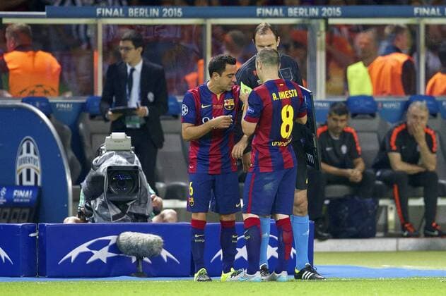(L-R) Xavi Hernandez of FC Barcelona Barca Andres Iniesta of FC Barcelona with Champions League trophy during the UEFA Champions League final match between Barcelona and Juventus on June 6, 2015 at the Olympic stadium in Berlin, Germany. Barcelona v Juventus Champions League final 2014 2015 xVIxxIVx 3947199