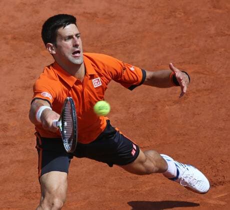 Novak Djokovic of Serbia hits a shot during his French Open men s final match against Stan Wawrinka of Switzerland at Roland Garros in Paris on June 7, 2015.  PAR20150607702 DAVIDxSILPA