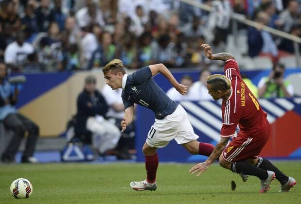 - PARIS, FRANCE: France s Antoine Griezmann and Belgium s Radja Nainggolan fight for the ball during a friendly game between France and Belgium in the Stade de France in Paris, France, Sunday 07 June 2015. The Devils are preparing for a Euro 2016 qualification game against Wales on Friday. DIRKxWAEM  x04637898x