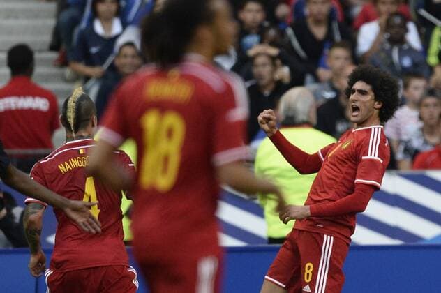 - PARIS, FRANCE: Belgium s Marouane Fellaini (R) celebrates after scoring during a friendly game between France and Belgium in the Stade de France in Paris, France, Sunday 07 June 2015. The Devils are preparing for a Euro 2016 qualification game against Wales on Friday. DIRKxWAEM  x04637895x