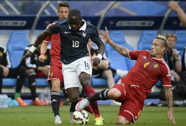- PARIS, FRANCE: Belgium s Dries Mertens, France s Moussa Sissoko and Belgium s Radja Nainggolan fight for the ball during a friendly game between France and Belgium in the Stade de France in Paris, France, Sunday 07 June 2015. The Devils are preparing for a Euro 2016 qualification game against Wales on Friday. DIRKxWAEM  x04637903x