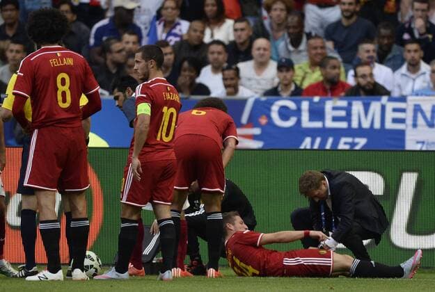 - PARIS, FRANCE: Belgium s Dries Mertens lies injured on the ground during a friendly game between France and Belgium in the Stade de France in Paris, France, Sunday 07 June 2015. The Devils are preparing for a Euro 2016 qualification game against Wales on Friday. DIRKxWAEM  x04637941x