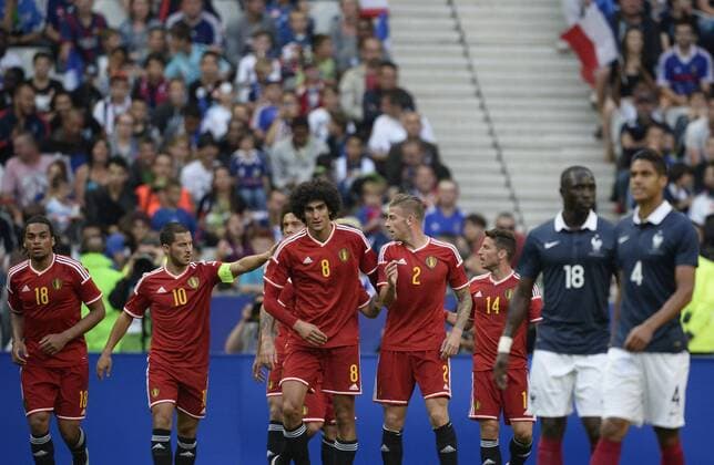 - PARIS, FRANCE: Belgium s Marouane Fellaini (C) celebrates with his teammates after scoring the 0-2 goal during a friendly game between France and Belgium in the Stade de France in Paris, France, Sunday 07 June 2015. The Devils are preparing for a Euro 2016 qualification game against Wales on Friday. DIRKxWAEM  x04637942x