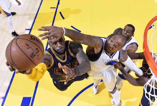 June 7, 2015 - Oakland, California, U.S - Cleveland Cavaliers forward LeBron James, left, shoots against Golden State Warriors forward Marreese Speights during the first half of Game 2 of basketball s NBA Basketball Herren USA Finals in Oakland, Calif., Sunday, June 7, 2015. Warriors vs Cavaliers - Game 2 - ZUMAp124