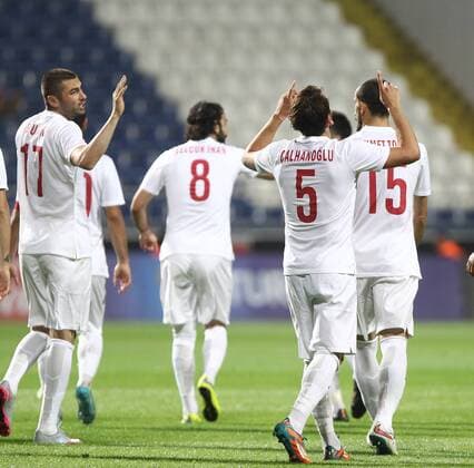 Friendly match between Turkey ( White ) and Bulgaria ( Red )at Recep Tayyip Erdogan Stadium in Istanbul on June 08,2015. Final Score: Turkey 4 - Bulgaria 0 Pictured: Turkey team players celebrates for Hakan Calhanoglu s second goal. 