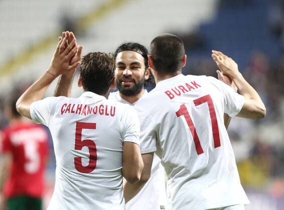 Friendly match between Turkey ( White ) and Bulgaria ( Red )at Recep Tayyip Erdogan Stadium in Istanbul on June 08,2015. Final Score: Turkey 4 - Bulgaria 0 Pictured: Selcuk Inan, Burak Yilmaz and Hakan Calhanoglu of Turkey . 