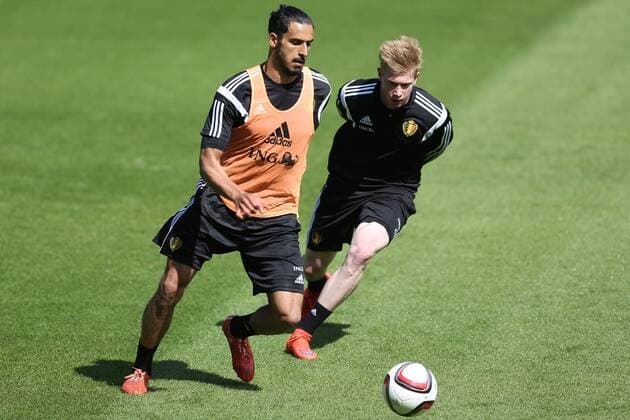 - BRUSSELS, BELGIUM: Belgium s Nacer Chadli and Belgium s Kevin De Bruyne fight for the ball during a training session of the Belgian national soccer team The Red Devils in Brussels, Tuesday 09 June 2015. The Devils are preparing for a Euro 2016 qualification game against Wales. BRUNOxFAHY  x04639614x