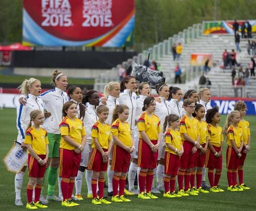 (150609) -- MONCTON, June 9, 2015 -- Players of England sing their national anthem before the group F match against France at the 2015 FIFA Women s World Cup in Moncton, Canada, June 9, 2015. France won 1-0. ) (SP)CANADA-MONCTON-FIFA WOMEN S WORLD CUP-GROUP F-FRANCE VS ENGLAND ZouxZheng 
