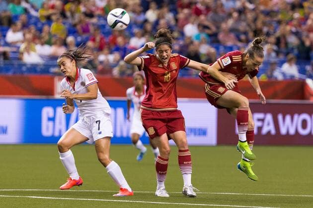 June 09, 2015 : Costa Rica forward Melissa Herrera 7 and Spain defender Marta Torrejon 18 reacts as the ball fly over their head during the 2015 FIFA Women s World Cup Group E match between Spain and Costa Rica at the Olympic Stadium in Montreal, Quebec, Canada. SOCCER: JUN 09 FIFA Women s World Cup - Group E - Spain v Costa Rica Icon15060907 EDITORIAL USE ONLY