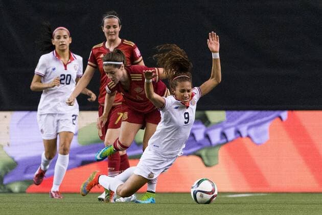 June 09, 2015 : Spain forward Vicky Losada 14 pushes Costa Rica forward Carolina Venegas 9 during the 2015 FIFA Women s World Cup Group E match between Spain and Costa Rica at the Olympic Stadium in Montreal, Quebec, Canada. SOCCER: JUN 09 FIFA Women s World Cup - Group E - Spain v Costa Rica Icon15060914 EDITORIAL USE ONLY