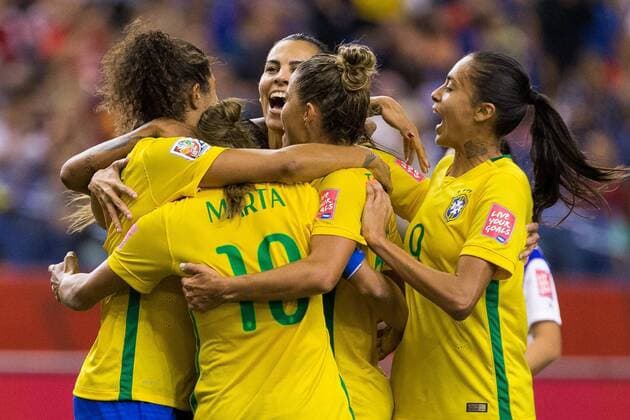 June 09, 2015 : Brazil midfielder Marta 10 celebrates her goal with teammates during the 2015 FIFA Women s World Cup Group E match between Brazil and Korea at the Olympic Stadium in Montreal, Quebec, Canada. SOCCER: JUN 09 FIFA Women s World Cup - Group E - Brazil v Korea Icon15060915 EDITORIAL USE ONLY