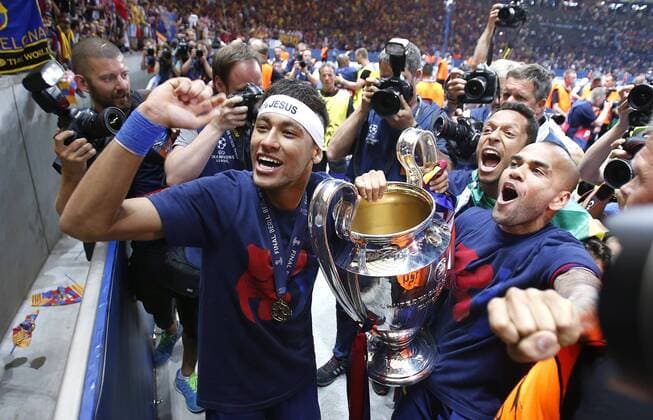 Neymar FC Barcelona Barca 11) (L), Adriano (FC Barcelona 21) and Dani Alves (FC Barcelona 22) celebrates the winning of the cup with fans after the Championsleague final match between Juventus and FC Barcelona, Olympiastadion in Berlin on June 06., 2015. Juventus Turin vs. FC Barcelona im Finale der Championsleague in der Saison 2014 2015 am 6. Juni 2015.