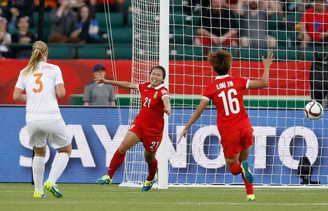 EDMONTON, June 11, 2015 -- Wang Lisi (C) of China celebrates scoring during the group A match between China and the Netherlands at the 2015 FIFA Women s World Cup in Edmonton, Canada, June 11, 2015.China won 1-0. ) (SP)CANADA-EDMONTON-FIFA-WOMEN S WORLD CUP-GROUP A-CHN VS NED WangxLili 