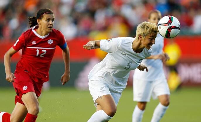 EDMONTON, June 11, 2015 -- Abby Erceg(R) of New Zealand heads the ball during the Group A match between Canada and New Zealand at Commonwealth Stadium in Edmonton, Canada on June 11, 2015. The match ended with a 0-0 draw. ) (SP)CANADA-EDMONTON-FIFA WOMEN S WORLD CUP-CAN VS NZL WangxLili 