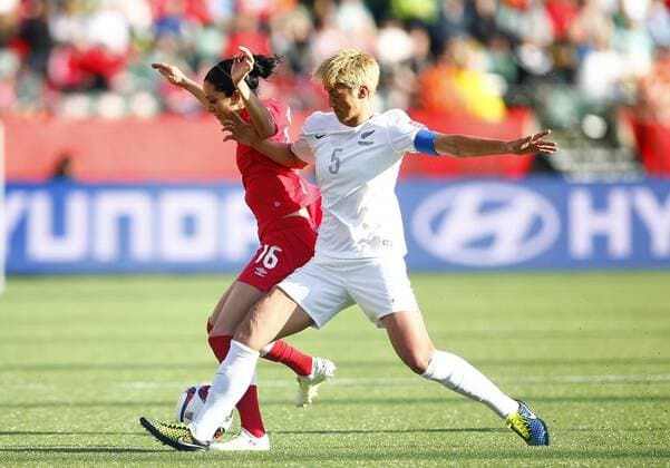 EDMONTON, June 11, 2015 -- Canada s Jonelle Filigno (L) vies with New Zealand s Abby Erceg during their Group A match at Commonwealth Stadium in Edmonton, Canada on June 11, 2015. The match ended with a 0-0 draw. ) (SP)CANADA-EDMONTON-FIFA WOMEN S WORLD CUP-CAN VS NZL DingxXu 