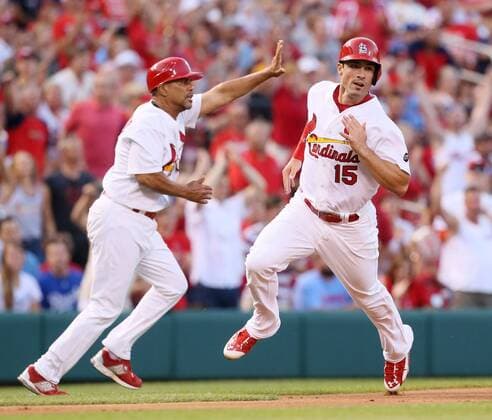 June 12, 2015 - St Louis, MO, USA - The St. Louis Cardinals Randal Grichuk runs past third base coach Jose Oquendo as he scores on a triple by Jon Jay in the second inning against the Kansas City Royals on Friday, June 12, 2015, at Busch Stadium in St. Louis. Kansas City at St. Louis - ZUMAm67_