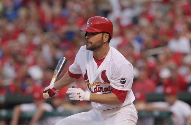 St. Cardinals Jaime Garcia swings, hitting a RBI single in the second inning against the Kansas City Royals at Busch Stadium in St. Louis on June 12, 2015.  SLP2015061201 BILLxGREENBLATT
