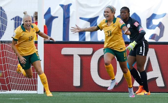 (150613) -- WINNIPEG, June 12, 2015 -- Australia s Kyah Simon (C) celebrates after scoring her second goal against Nigeria during their group D match at the 2015 FIFA Women s World Cup in Winnipeg, Canada, June 12, 2015. Australia won the match 2-0. ) (SP)CANADA-WINNIPEG-FIFA WOMEN S WORLD CUP-GROUP D-NGA VS AUS WangxLili 